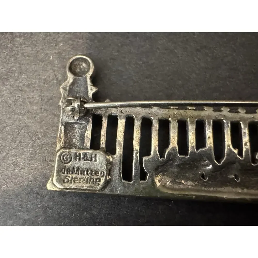 Hand & Hammer Silversmiths brand hand